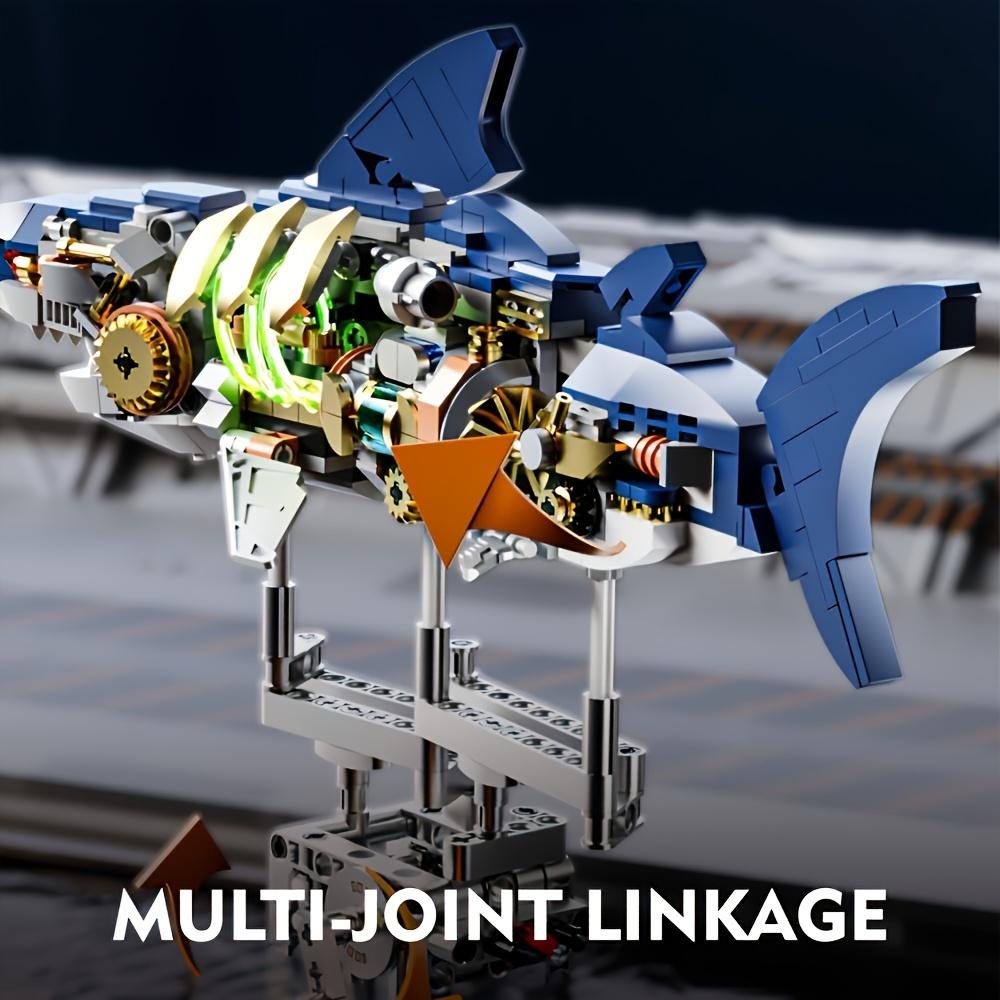 Ocean Explorer 687-Piece Blue Shark Model Building Kit with Lighting and Display Bracket Adopts ABS Material, Multi-Joint Linkage Mechanism, STEM Educational Toys Suitable for Ocean Lovers
